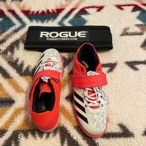 Rouge weight belt and adidas weightlifting shoes.